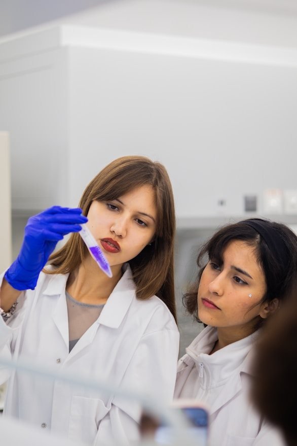 Two young researchers working in a laboratory